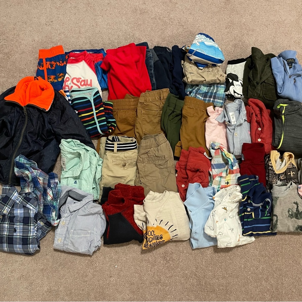 30+ Items including shirts, jacket, hoodie, pants, bathing suits